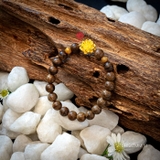 Vòng tay Trầm Hương cho nữ 7 li cận chìm mix Vàng