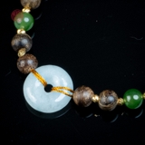 Vòng tay Trầm Hương nữ cận chìm 6 li mix charm ngọc ( kiểu 1 )