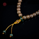 Vòng tay Trầm Hương nữ cận chìm 6 li mix Hổ Phách ( kiểu 4 )