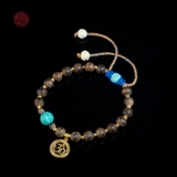 Vòng tay Trầm Hương cận chìm 6 li mix charm Vàng và đá Tây Tạng ( kiểu 9 )