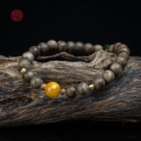 Vòng tay Trầm Hương nữ cận chìm 6 li mix Hổ Phách ( kiểu 4 )