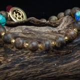 Vòng tay Trầm Hương cận chìm 6 li mix charm Vàng và đá Tây Tạng ( kiểu 9 )