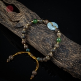 Vòng tay Trầm Hương nữ cận chìm 6 li mix charm ngọc ( kiểu 1 )