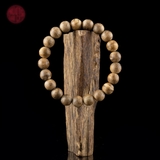 Vòng tay Trầm Hương tròn 8 li banh bông