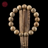 Vòng tay Trầm Hương tròn 12 li banh bông già