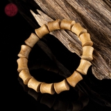 Vòng tay Trầm Hương trúc xương 10 li banh đỏ