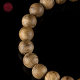 Vòng tay Trầm Hương tròn 8 li banh bông