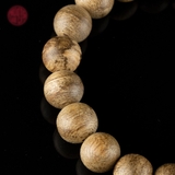 Vòng tay Trầm Hương tròn 10 li banh bông