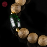 Vòng tay Trầm Hương tròn banh bông dầu tốt mix ngọc