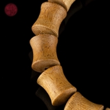 Vòng tay Trầm Hương trúc xương 10 li banh đỏ