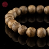 Vòng tay Trầm Hương tròn 8 li banh bông