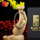 Vòng tay Trầm Hương cho nữ tròn cận chìm 6 li mix charm vàng