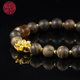 Vòng tay Trầm Hương cho nữ tròn cận chìm 6 li mix charm vàng