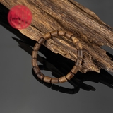 Vòng tay Trầm Hương trúc 6 li banh dầu cho nữ