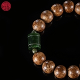 Vòng tay Trầm Hương tròn 12 li rục Bruney