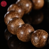 Vòng tay Trầm Hương tròn 12 li rục Bruney