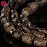 Vòng tay Trầm Hương hạt khúc tự nhiên cận chìm Malay  ( Có mặt rục )