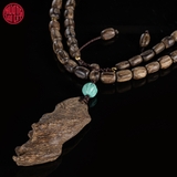 Vòng tay Trầm Hương hạt khúc tự nhiên cận chìm Malay  ( Có mặt rục )