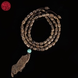 Vòng tay Trầm Hương hạt khúc tự nhiên cận chìm Malay  ( Có mặt rục )