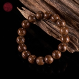 Vòng tay Trầm Hương tròn 12 li rục Bruney