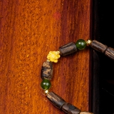 Vòng tay trầm hương chìm nước dạng hạt tự nhiên mix vàng 24k