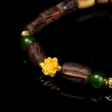 Vòng tay trầm hương chìm nước dạng hạt tự nhiên mix vàng 24k