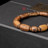 Vòng tay Trầm Hương rục chìm dạng hạt tự nhiên cho tay nữ (7,3g )