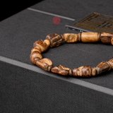 Vòng tay Trầm Hương rục chìm dạng hạt tự nhiên cho tay nữ (6,4g )