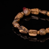 Vòng tay Trầm Hương rục chìm dạng hạt tự nhiên cho tay nữ (6,4g )