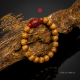 Vòng trầm hương banh quầng 10 li mix ngọc đỏ