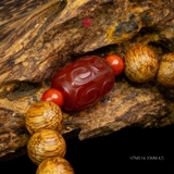 Vòng trầm hương banh quầng 10 li mix ngọc đỏ