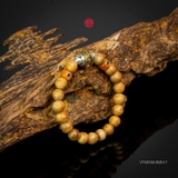 Vòng trầm hương tròn banh bông 8 li mix charm bạc