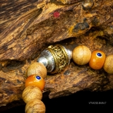 Vòng trầm hương tròn banh bông 8 li mix charm bạc