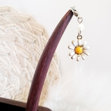 TRÂM CÀI TUA RUA HOA CÚC