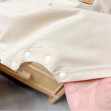 Body giả yếm kẽ hình gấu cầu vồng cho bé