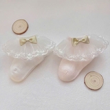 Tất vớ ren công chúa đính nơ vàng cho bé