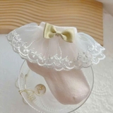 Tất vớ ren công chúa đính nơ vàng cho bé