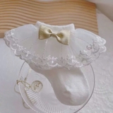 Tất vớ ren công chúa đính nơ vàng cho bé
