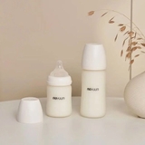 Bình sữa Moyuum thủy tinh tráng silicon cho bé