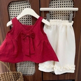 Set bộ áo đũi nơ đỏ quần xuống kem cho bé gái