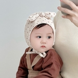 Nón mũ cột dây nơ chấm bi cho bé