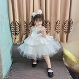 Đầm công chúa dây chéo đính nơ