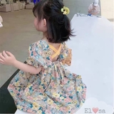 Đầm hoa vạt chéo sau lưng