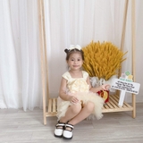 Đầm xoè ren nhiều tầng nơ ngực kèm cài tóc