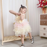 Đầm xoè ren nhiều tầng nơ ngực kèm cài tóc