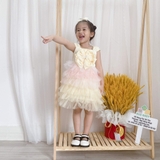Đầm xoè ren nhiều tầng nơ ngực kèm cài tóc