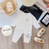 Bộ dài trắng sơ sinh cúc lệch Minium in gấu thỏ ở ngực