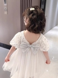 Đầm ren trắng hoa nổi phối nơ lưng