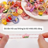 Túi dây buộc tóc nhiều hình cho bé gái
