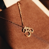 DÂY CHUYỀN CHỮ OM - S999